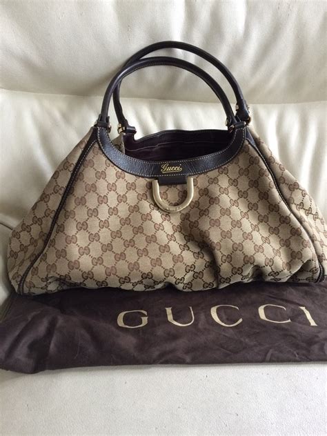 codigo de bolsa gucci|bolsas gucci originales precios.